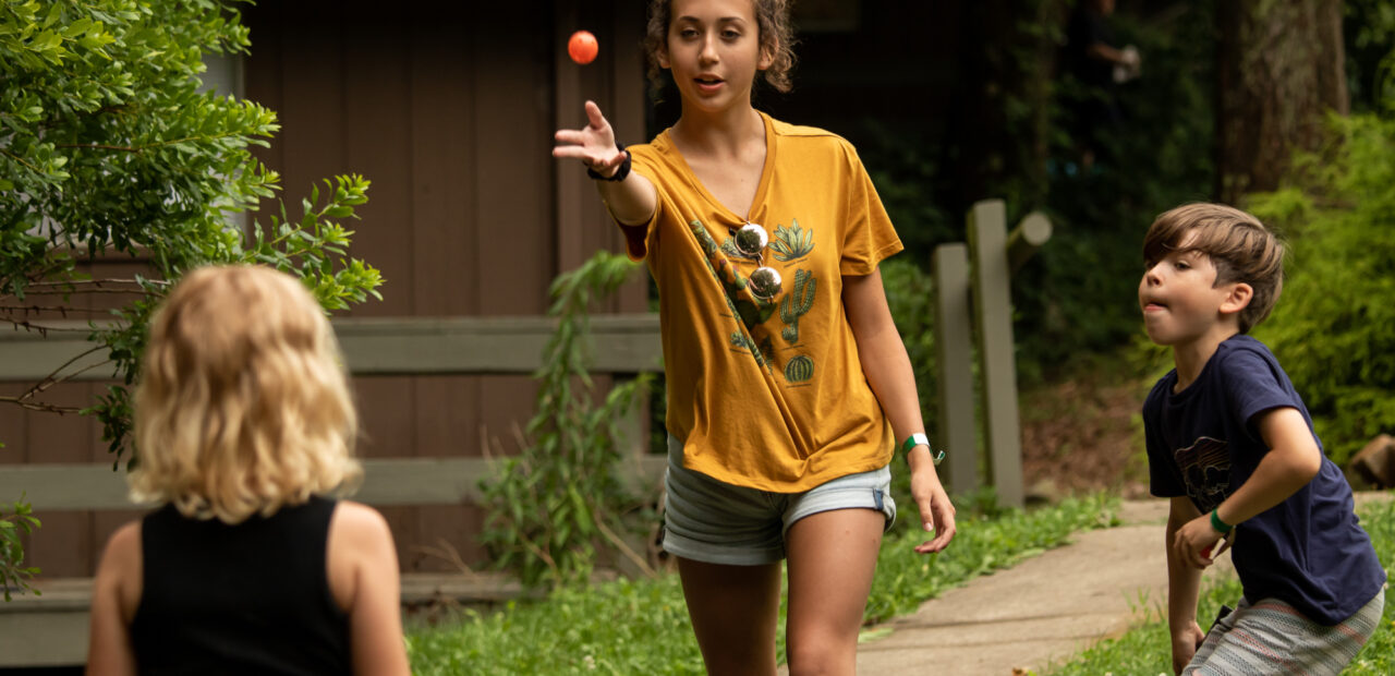 Kids playing wiffle ball