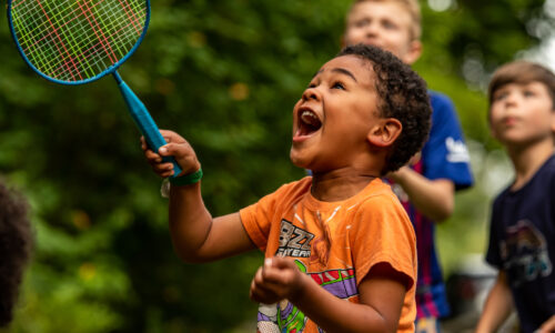 Kids playing badminton