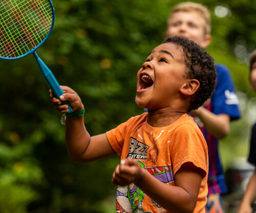 Kids playing badminton