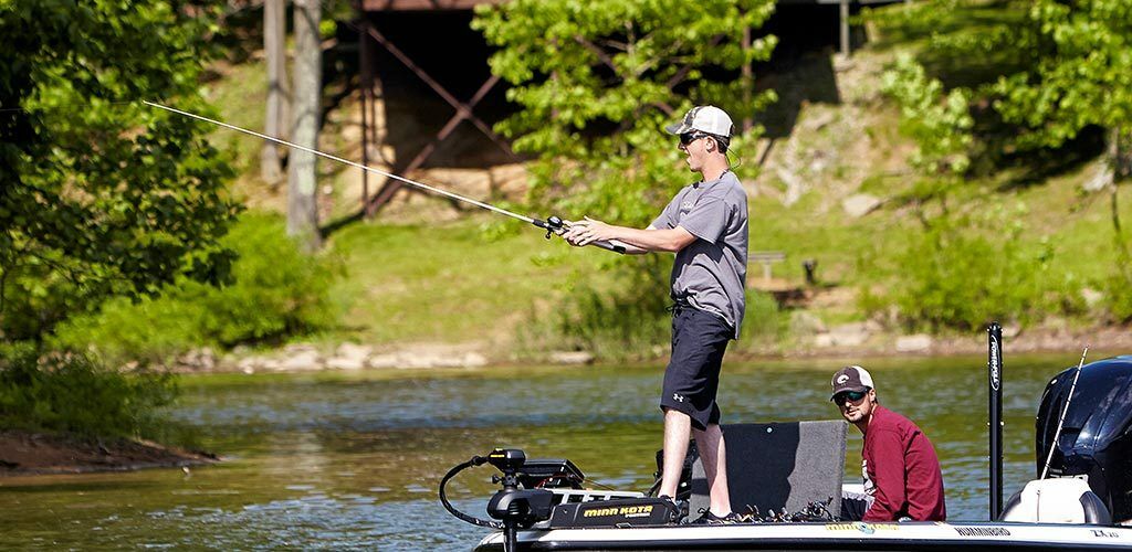 People fishing in a boat